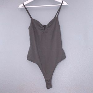 Rue21 camouflage green thong bodysuit!